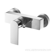 Cubic single level shower faucet